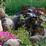 Innovative Landscaping with Boulders: Tips for Integrating Natural Elements